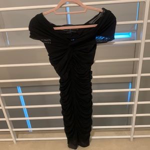 Beautiful black dress, never worn but took off tags
